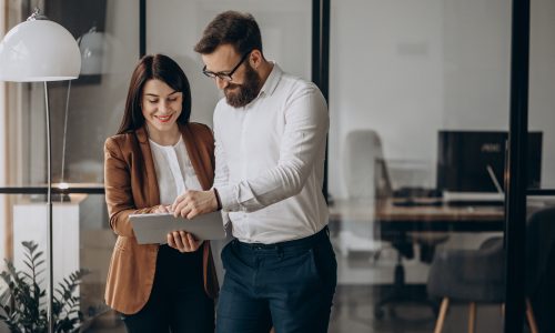 two-business-partners-working-office